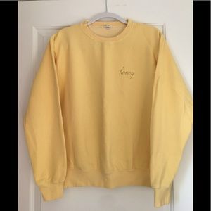 Brandy Melville John Galt yellow “Honey” sweatshirt.  Size S